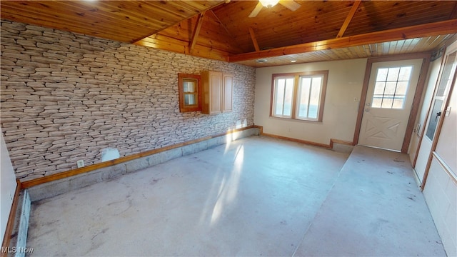 spare room featuring ceiling fan and wood ceiling