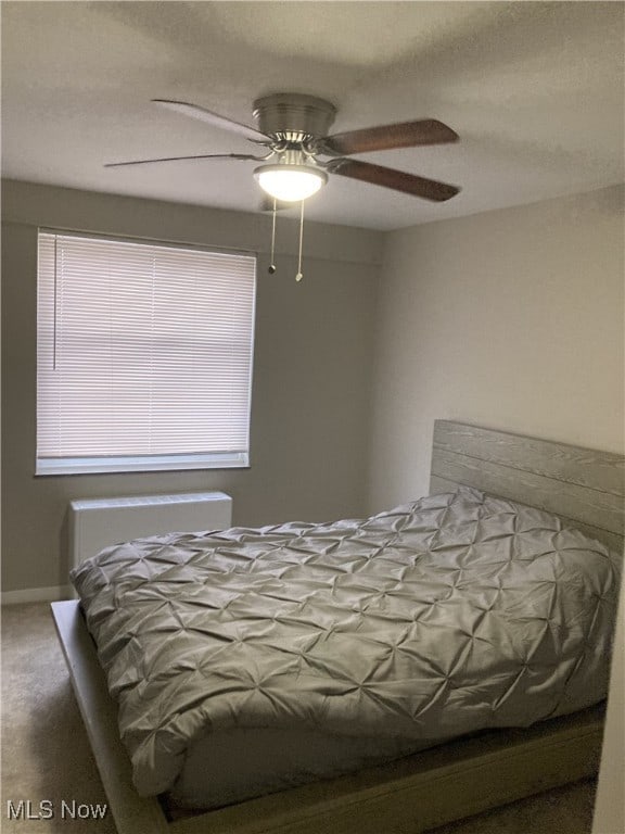 bedroom with carpet and ceiling fan