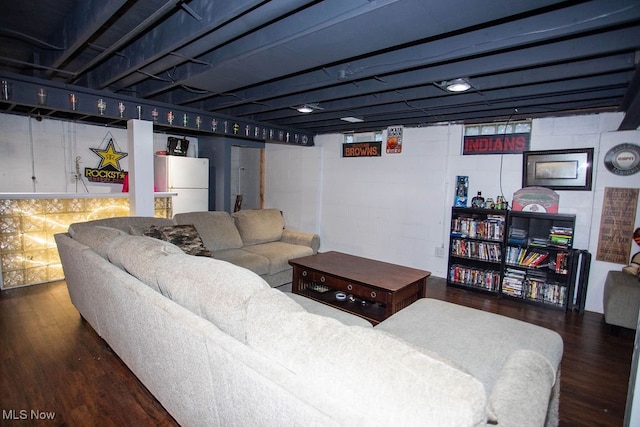 living room with dark hardwood / wood-style floors