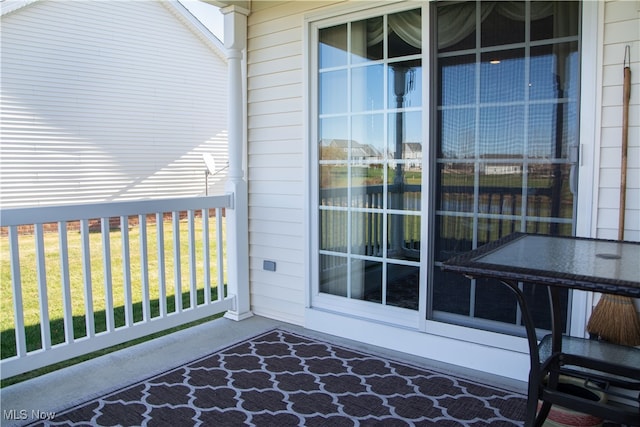 exterior space featuring vaulted ceiling