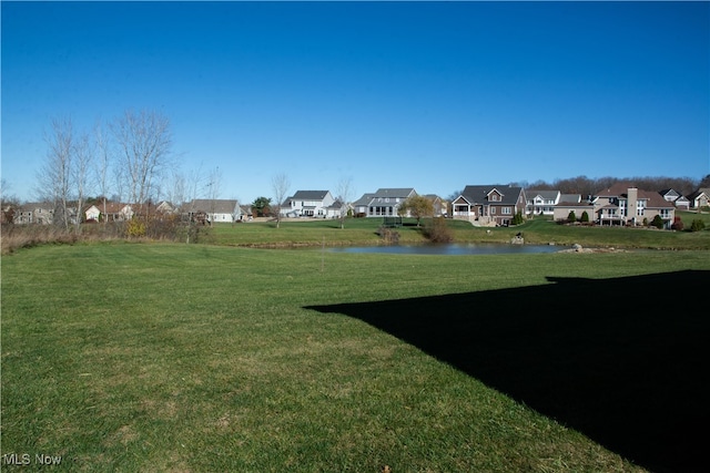 view of yard featuring a water view