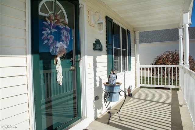 entrance to property with a porch