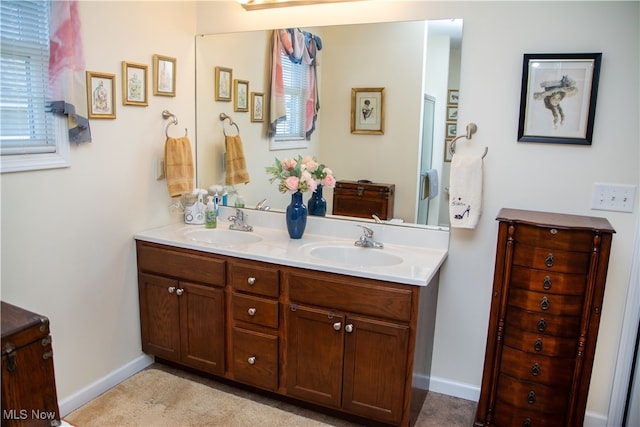 bathroom featuring vanity and a wealth of natural light