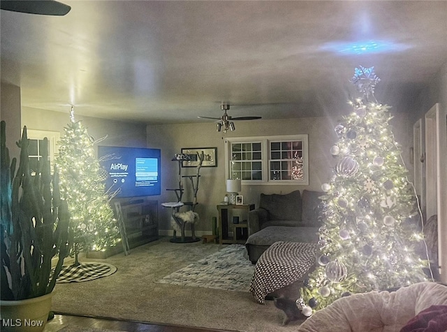 carpeted bedroom featuring ceiling fan