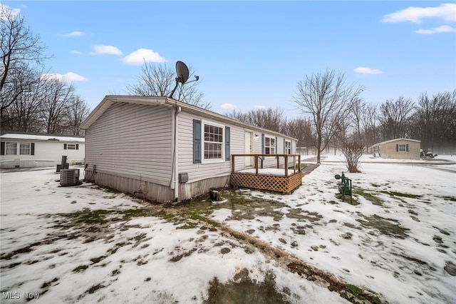 view of snow covered property