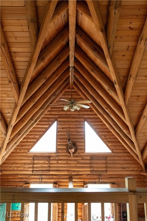 room details with rustic walls and wooden ceiling