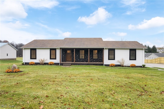 ranch-style home with a front yard