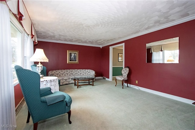 living area featuring carpet flooring, a wealth of natural light, and crown molding