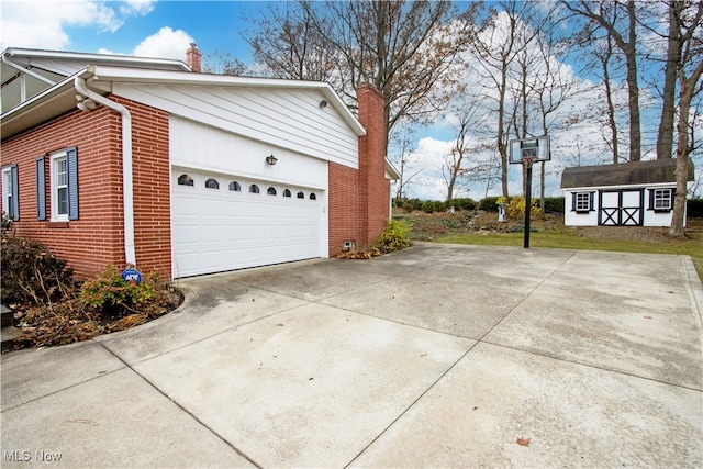 view of home's exterior featuring a storage unit