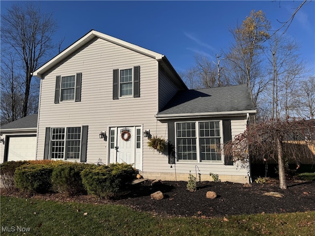 view of front of home featuring a garage