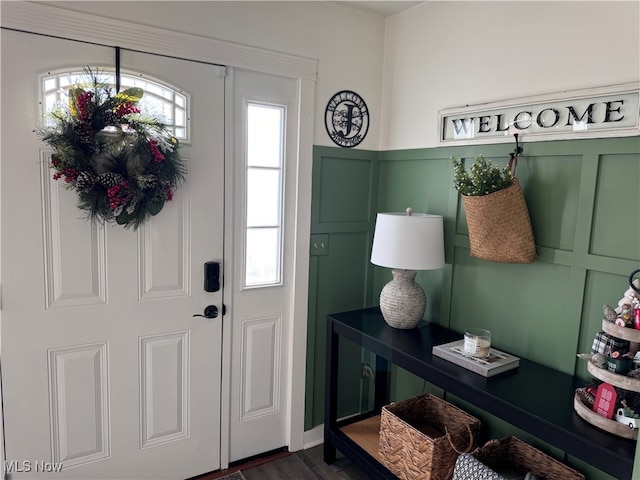 foyer entrance featuring dark hardwood / wood-style floors