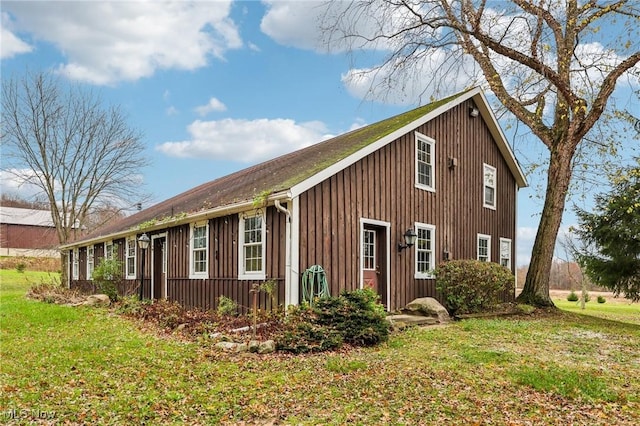 exterior space with a front yard