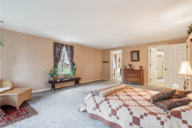 bedroom featuring baseboards, carpet flooring, and wallpapered walls