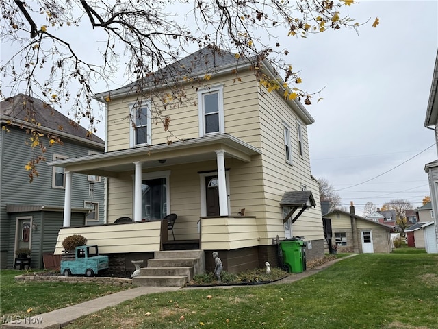 view of front of house featuring a front lawn and a porch