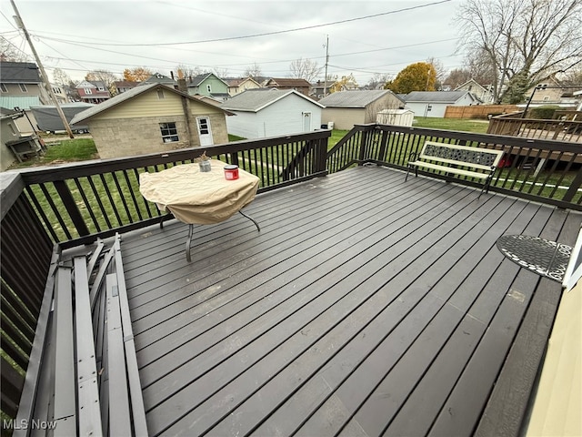 deck featuring a yard