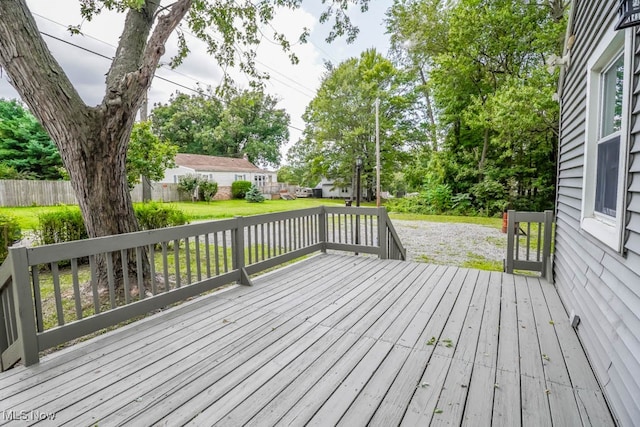 deck featuring a lawn