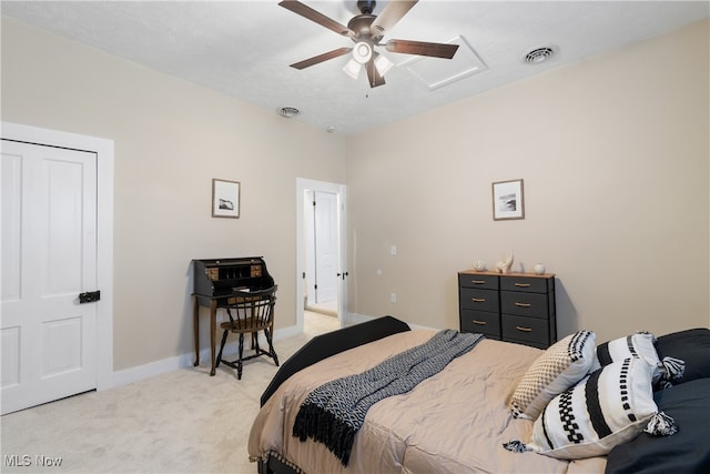 bedroom with light carpet and ceiling fan