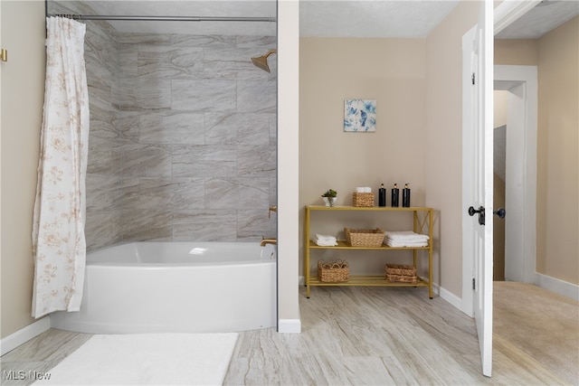 bathroom featuring hardwood / wood-style floors and shower / tub combo