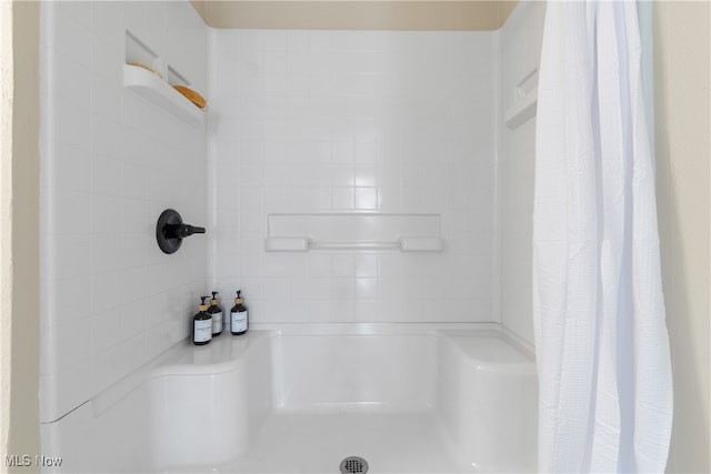 bathroom with walk in shower