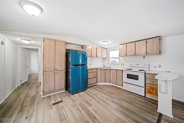 kitchen featuring electric stove, sink, refrigerator, light hardwood / wood-style floors, and light brown cabinets