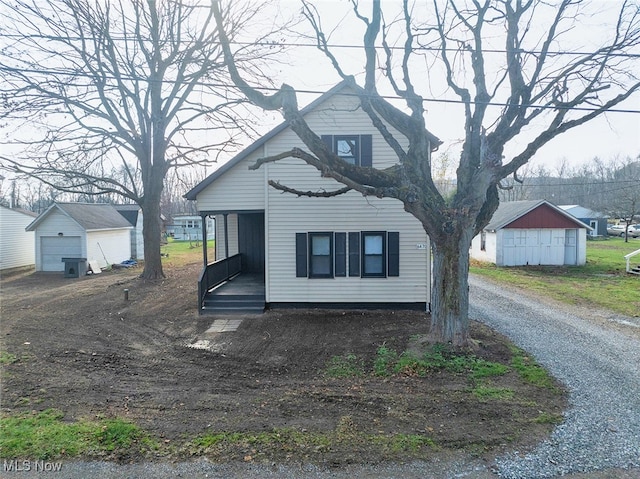 view of front of home featuring an outbuilding and a garage