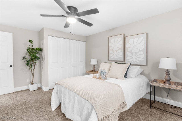 bedroom with carpet floors, a closet, and ceiling fan