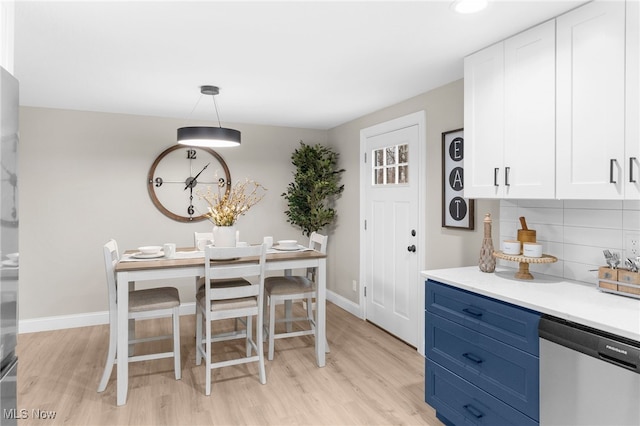 dining room featuring light hardwood / wood-style flooring