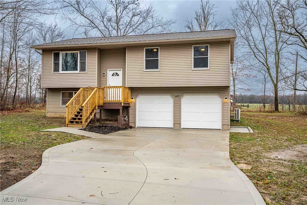 raised ranch featuring a garage