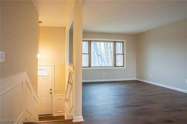 foyer featuring dark hardwood / wood-style floors