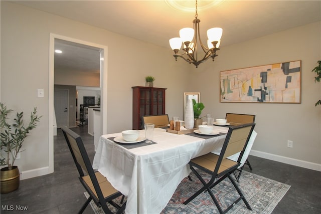 dining area featuring a chandelier