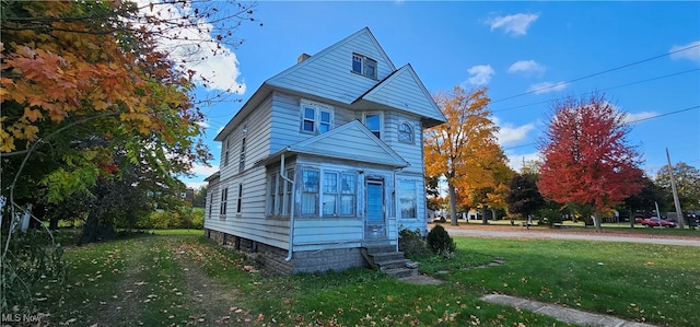 exterior space with a front lawn