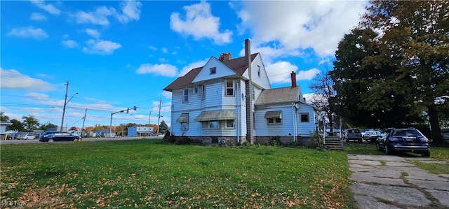 view of property exterior with a lawn