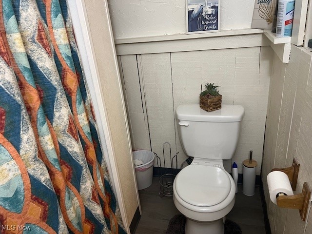 bathroom featuring toilet