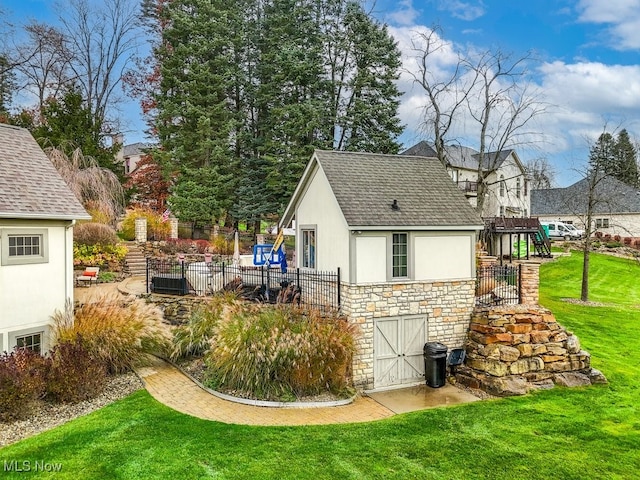 view of outdoor structure featuring a yard