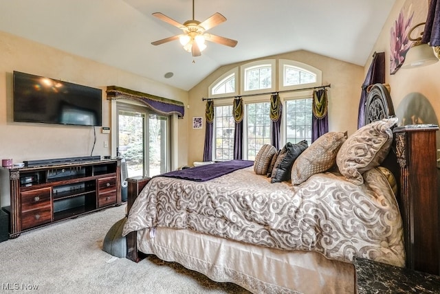 bedroom with carpet flooring, ceiling fan, vaulted ceiling, and access to outside