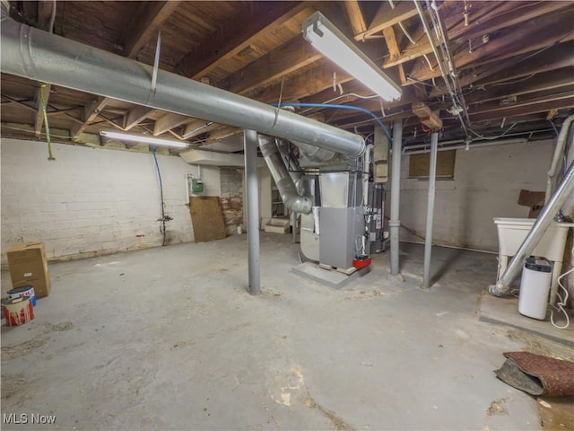 unfinished basement with heating unit