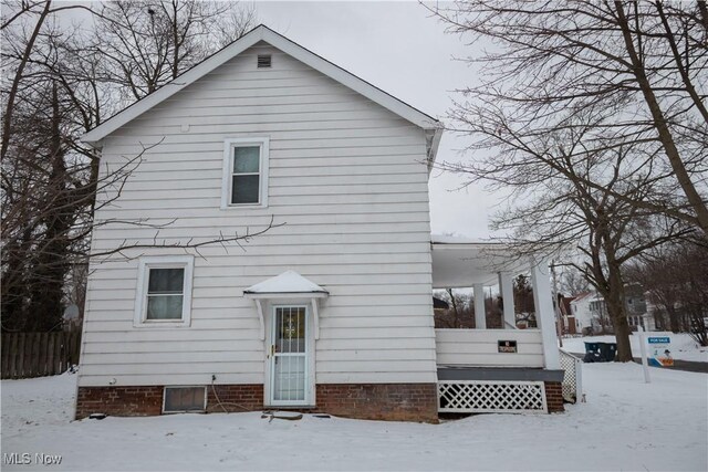 view of snow covered property