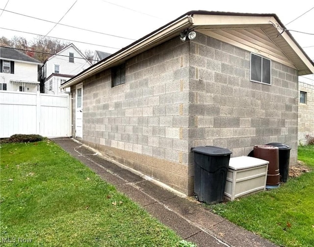 view of home's exterior featuring a lawn