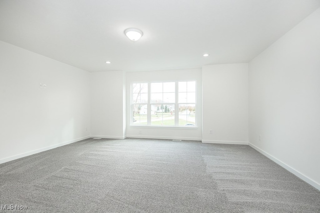 spare room with carpet flooring