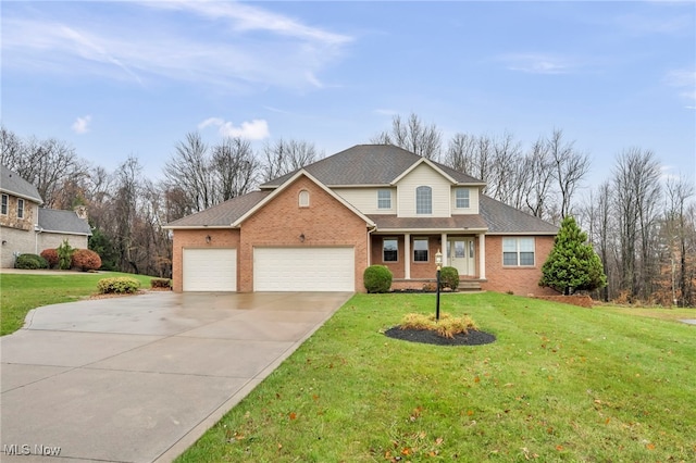 view of front property featuring a garage and a front lawn