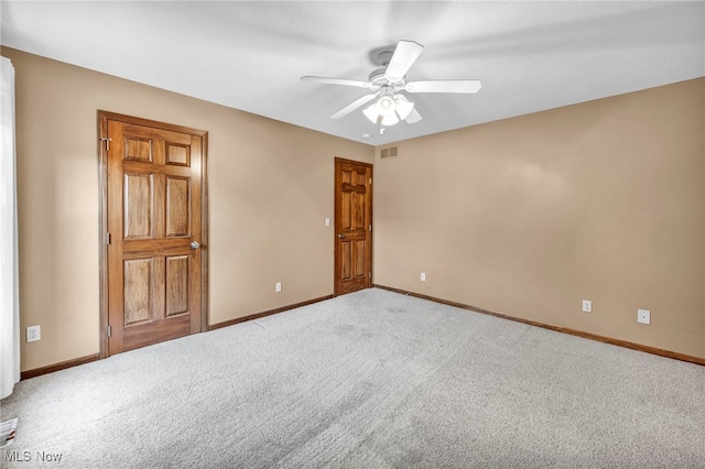 unfurnished bedroom with carpet floors and ceiling fan