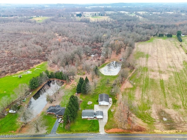 aerial view featuring a rural view and a water view