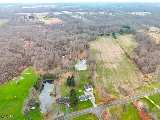 drone / aerial view featuring a rural view and a water view