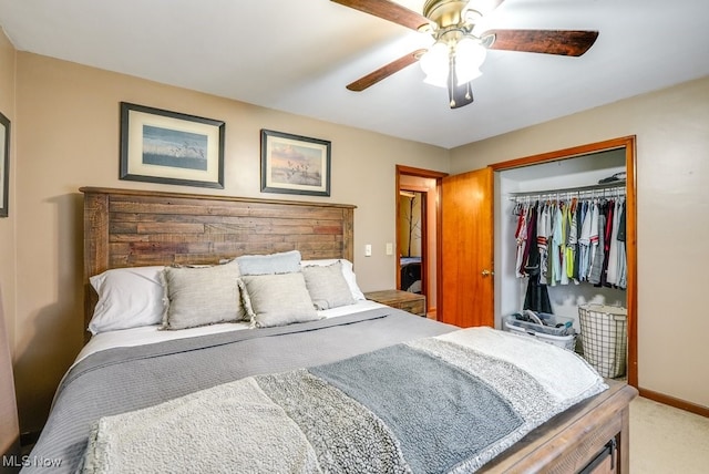 carpeted bedroom with ceiling fan and a closet