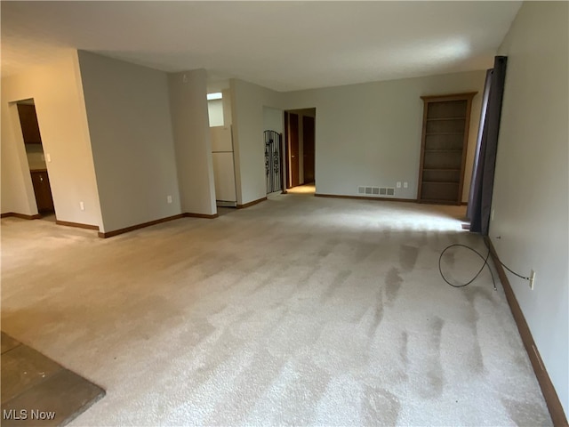 empty room with light carpet