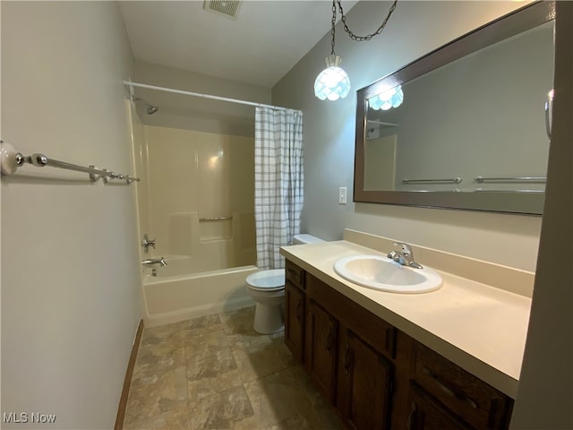 full bathroom featuring shower / bath combo, toilet, and vanity