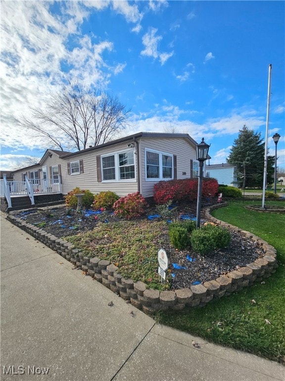 ranch-style house with a front yard