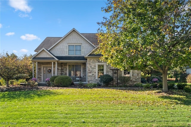 view of front of property with a front lawn