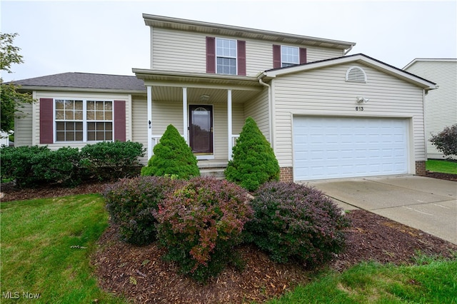 front of property with a garage