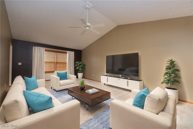 living room with ceiling fan and lofted ceiling